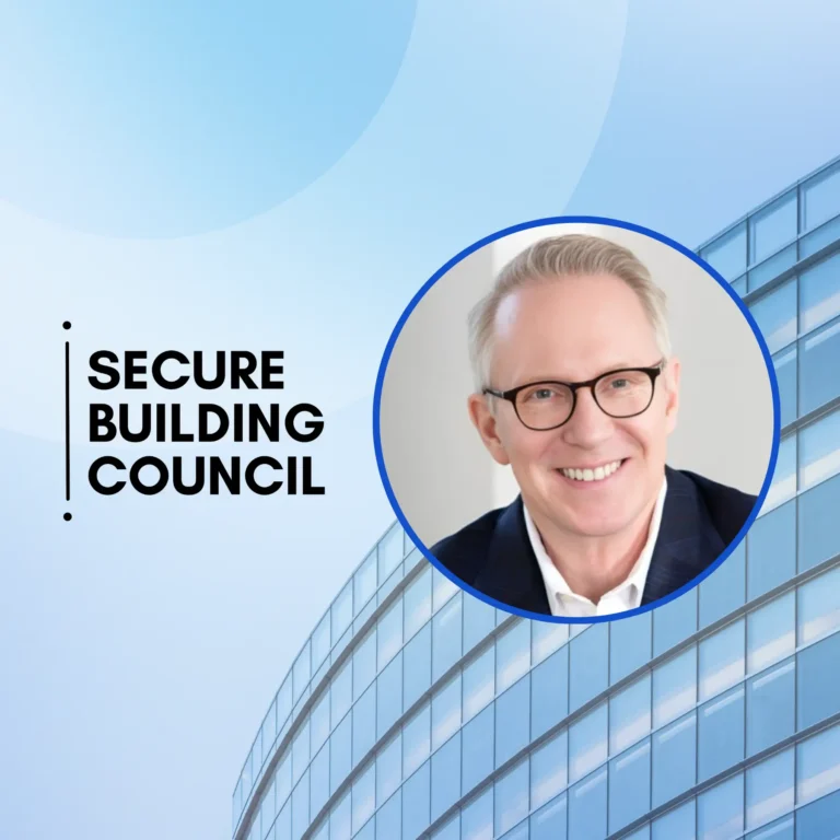 Banner with a smiling man in a blue circular frame over a blue glass building background and the text 'Secure Building Council' on the left.