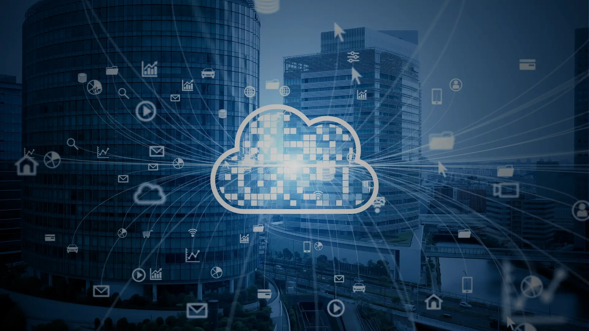 Blue-toned cityscape with a glowing cloud icon representing cloud computing and data networks.